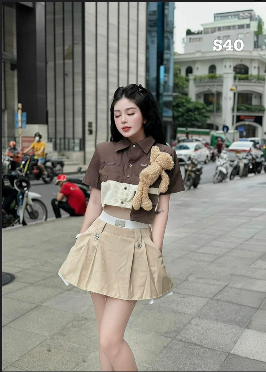 Chân váy Xếp Li Nâu Kèm Gấu 